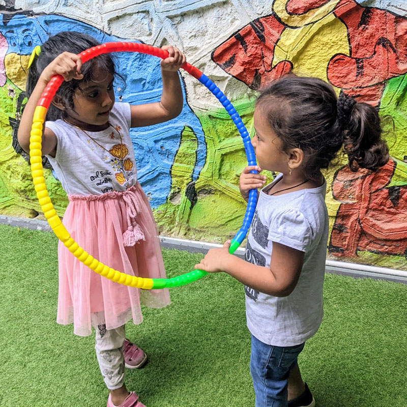 hula lopp playing children